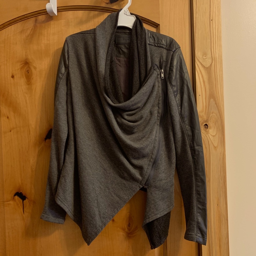 Semi-formal sweater & leather material jacket.